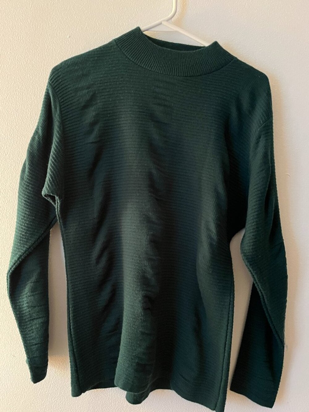Green knit sweater for women size L with crew neck perfect to stay warm.
